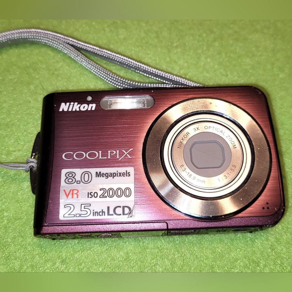 SOLD!!!Nikon Coolpix S210 8 MP with 3x Optical Zoom Digital Camera with charger